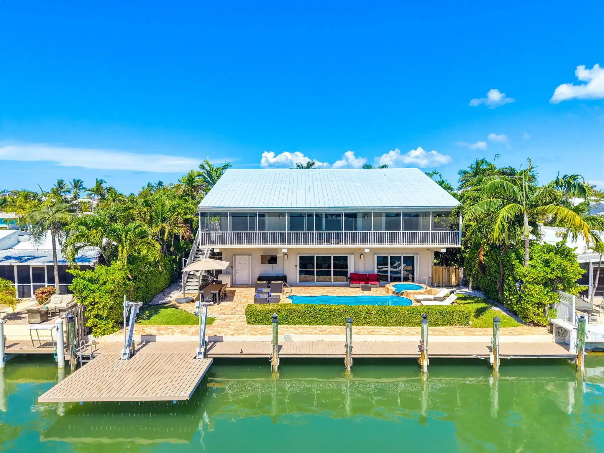 Image 1: Canal-Front Home with Boat Lift & Pool