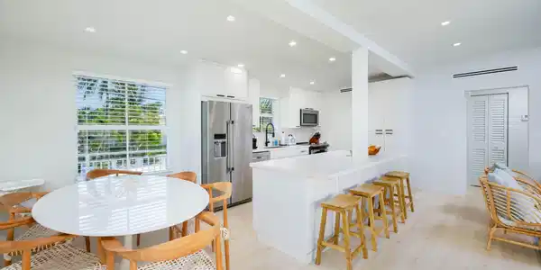 Image 2: Dining area and kitchen