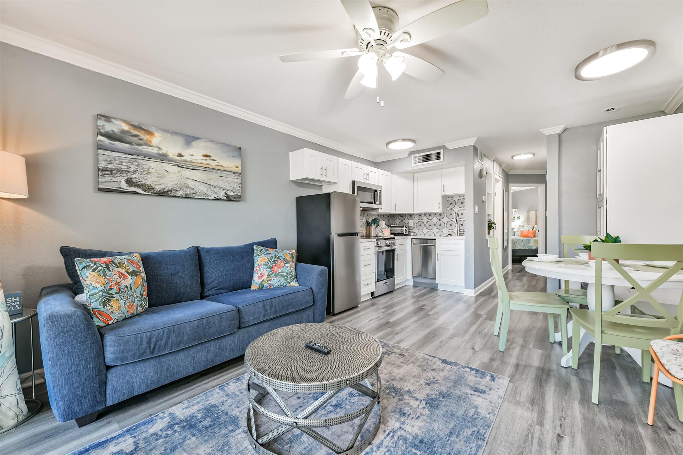 Image 3: This charming condo is beautifully decorated and c