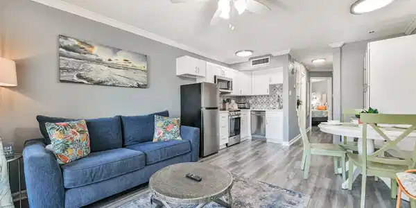 Image 3: This charming condo is beautifully decorated and c