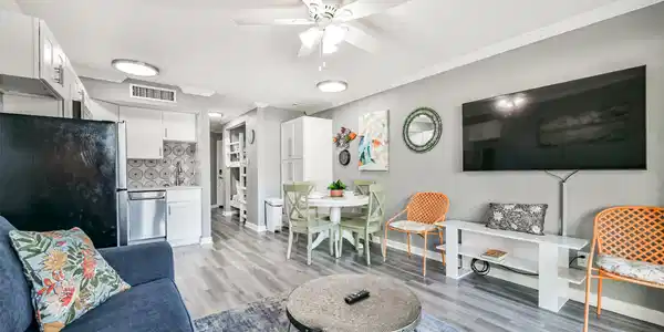Image 4: This inviting open-plan living space features a co