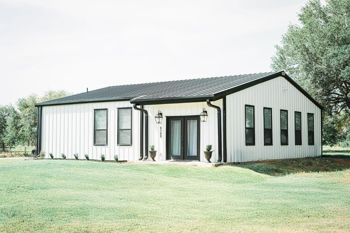 Image 1: Beautiful modern barndominium with a touch of coun