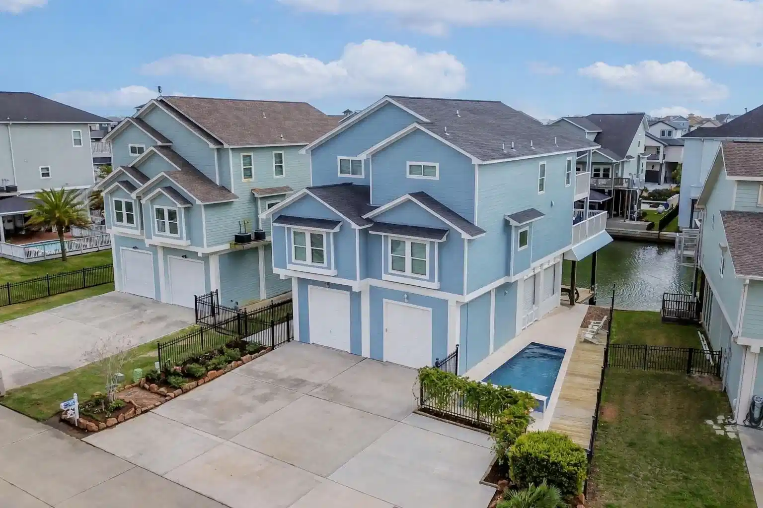 Image 1: Coastal elegance meets waterfront living in this b