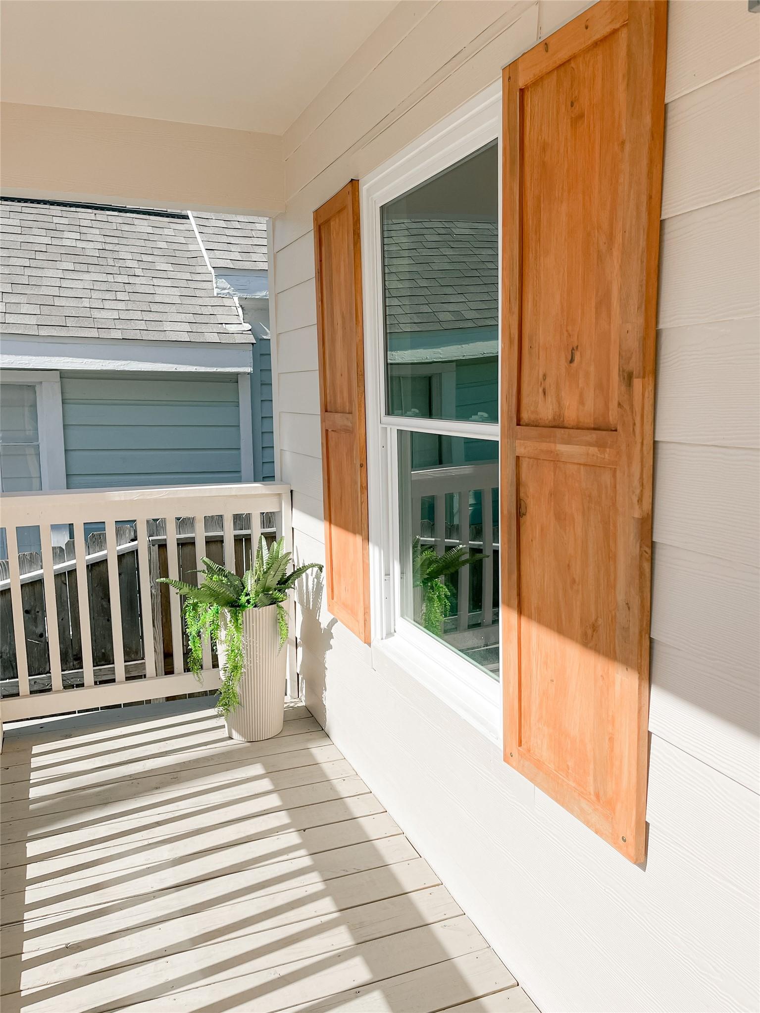Image 2: South facing front porch - is a nice place to rela