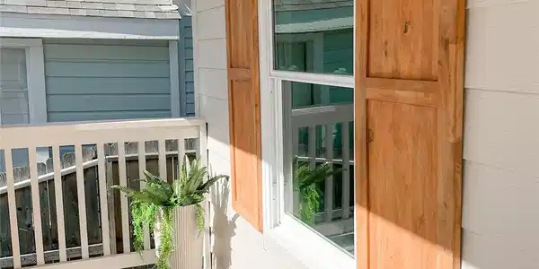 Image 2: South facing front porch - is a nice place to rela