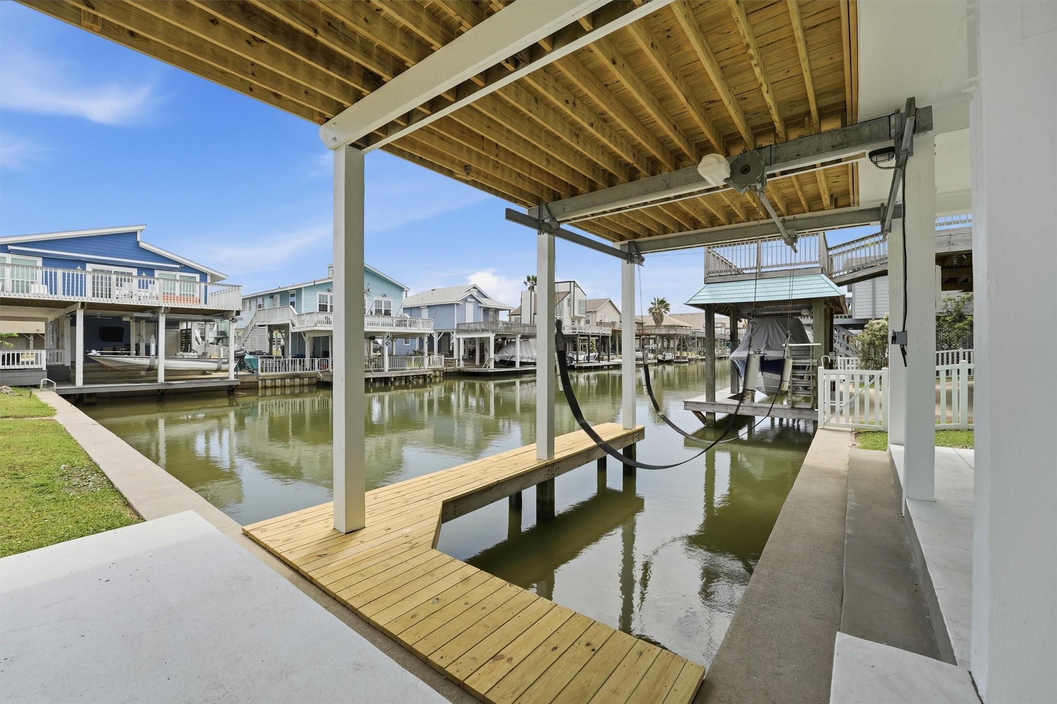 Image 3: Private canal access with a boat lift makes it eas
