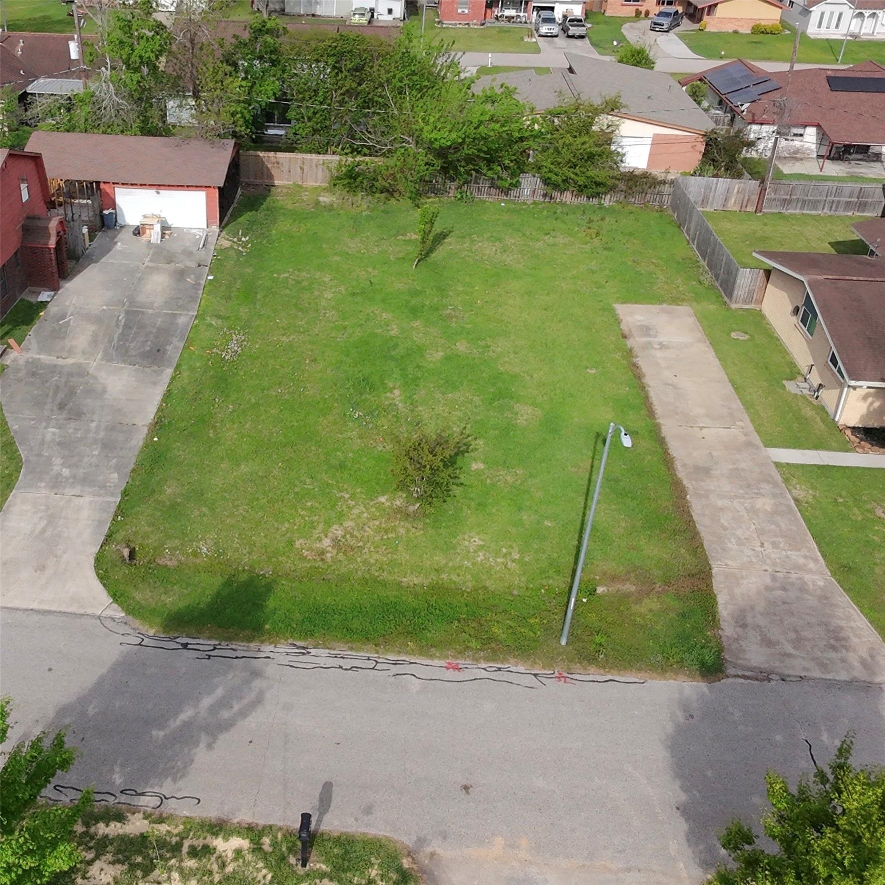 Image 3: Aerial view of empty lot