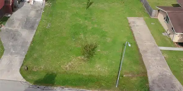 Image 3: Aerial view of empty lot