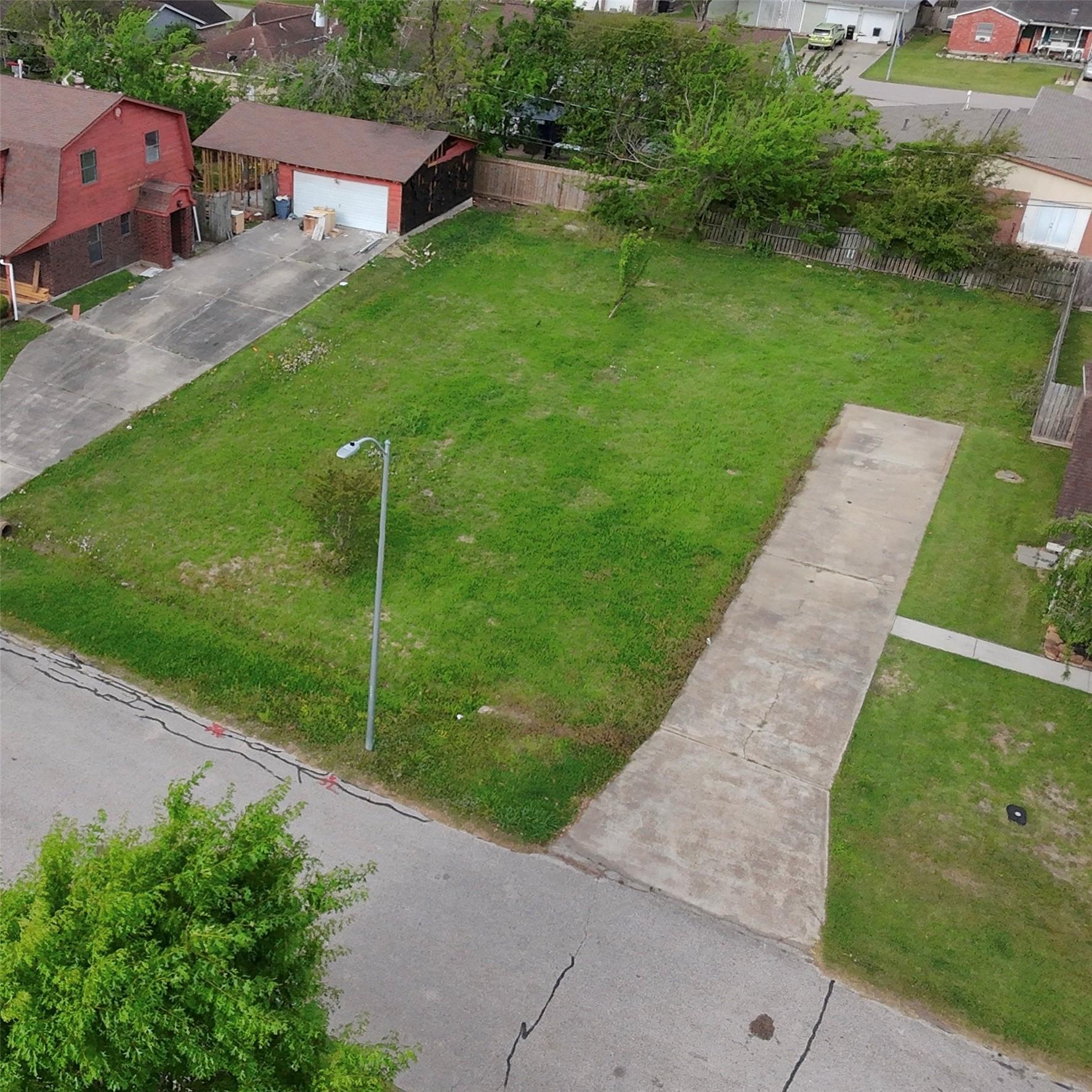 Image 4: Aerial view of empty lot