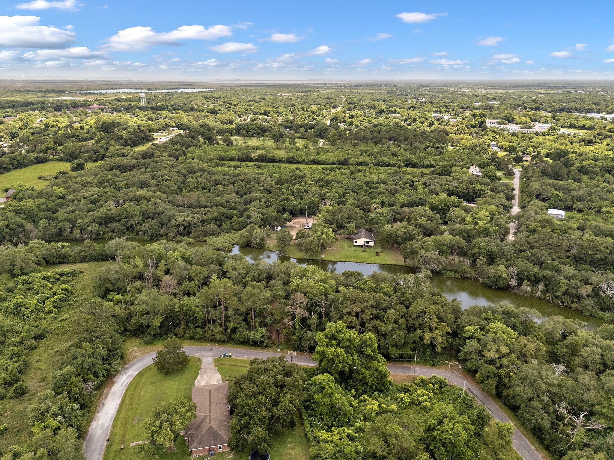 Image 3: Aerial view of the bayou frontage lots ready for y