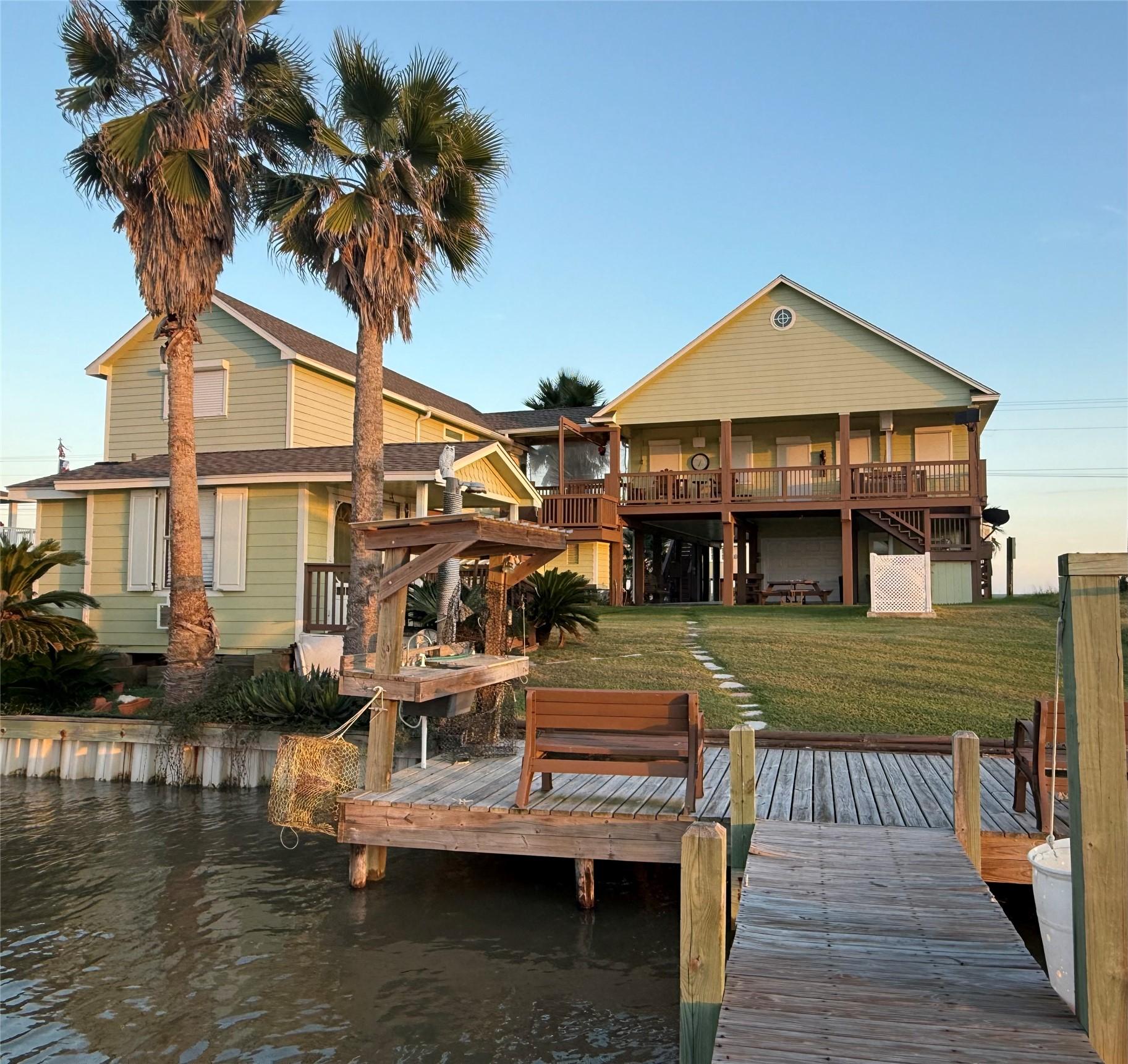 Image 3: Experience serene waterfront living with this char