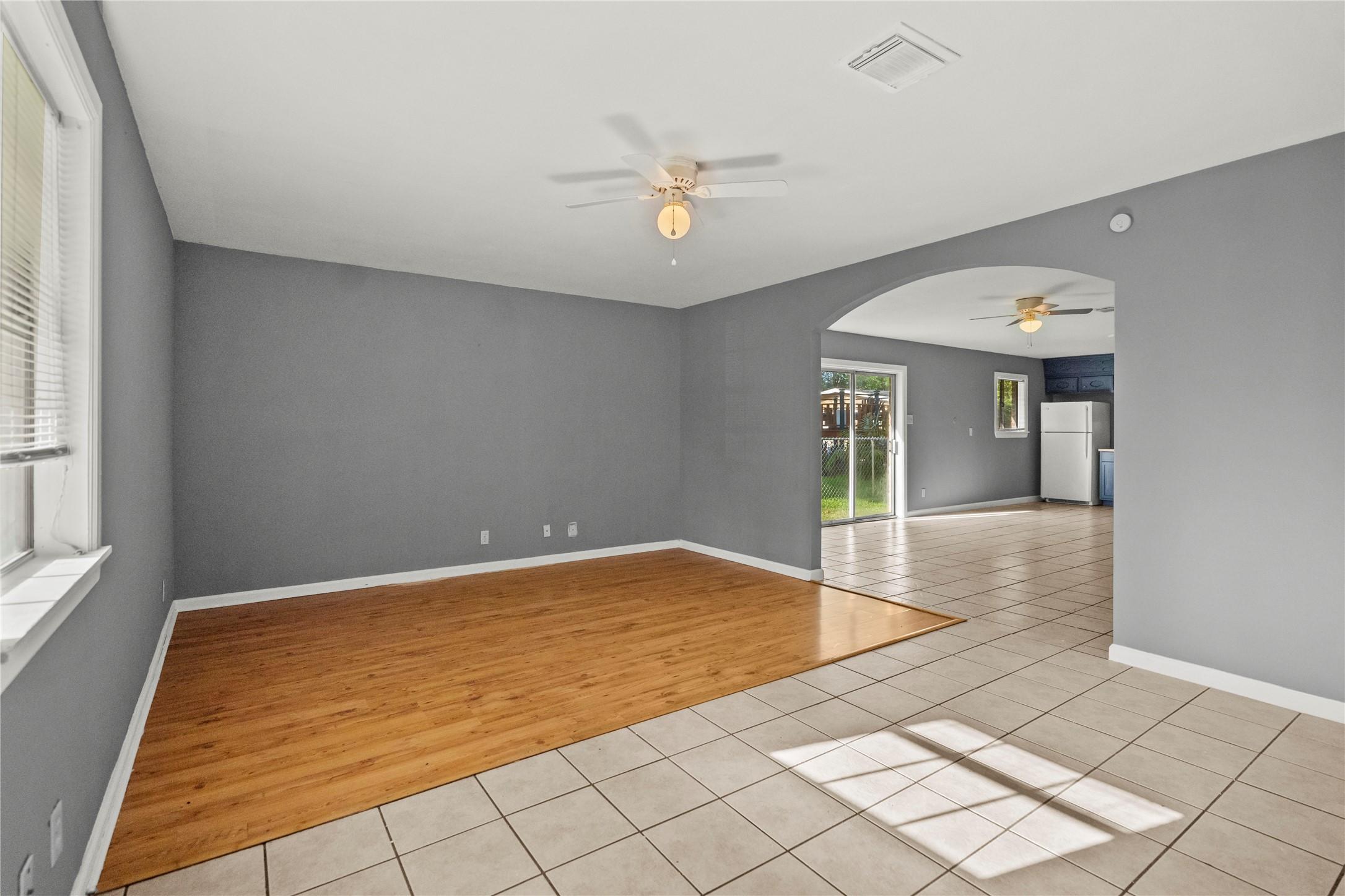 Image 3: Freshly painted large living room.