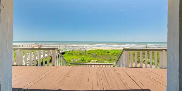 Image 2: Deck shows fantastic view of ocean and beach!