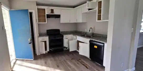 Image 4: Kitchen with door to outside
