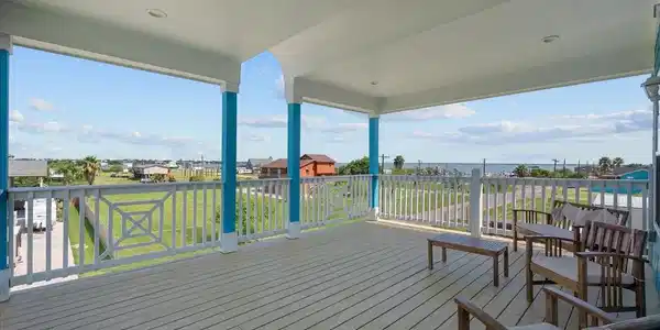 Image 4: Huge deck on second floor with views of the bay
