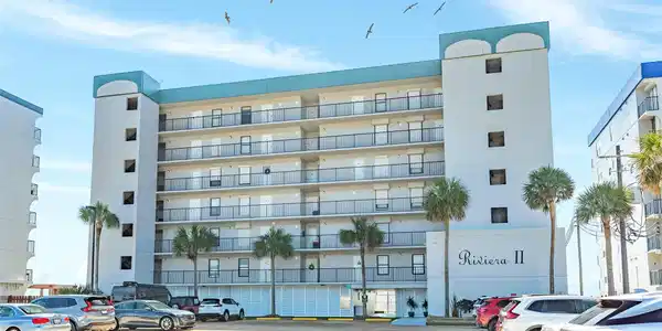 Image 2: Riviera II with gated entrance and surface parking