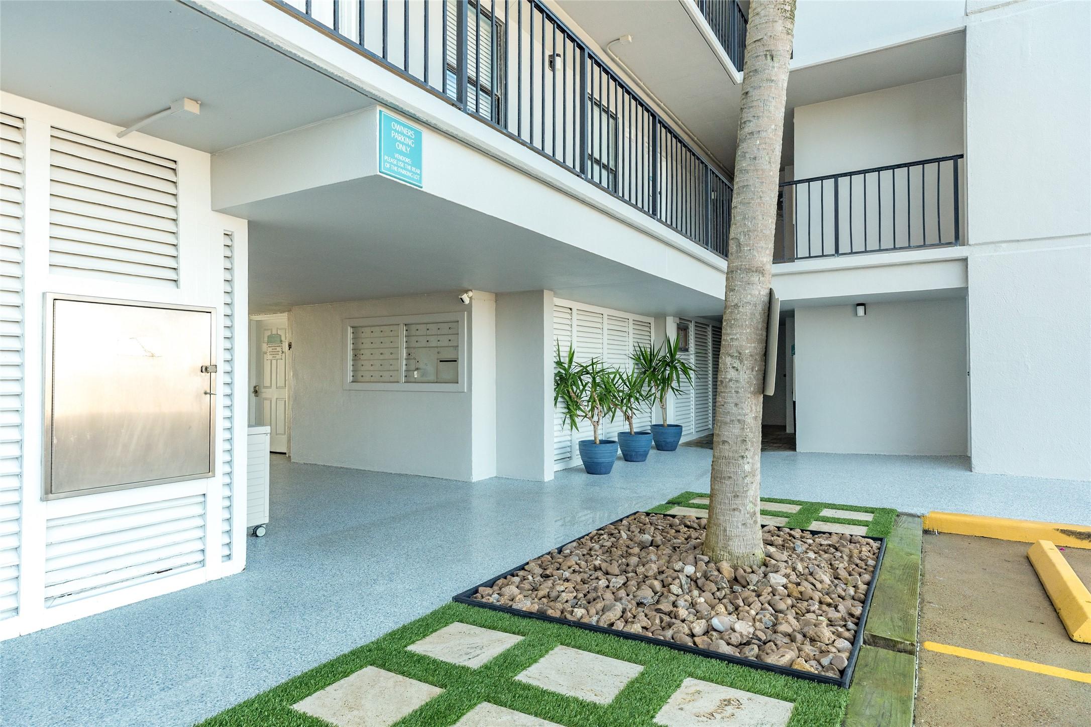 Image 3: Nicely landscaped entrance