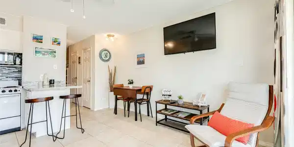 Image 2: Breakfast table and countertop offer room for dini