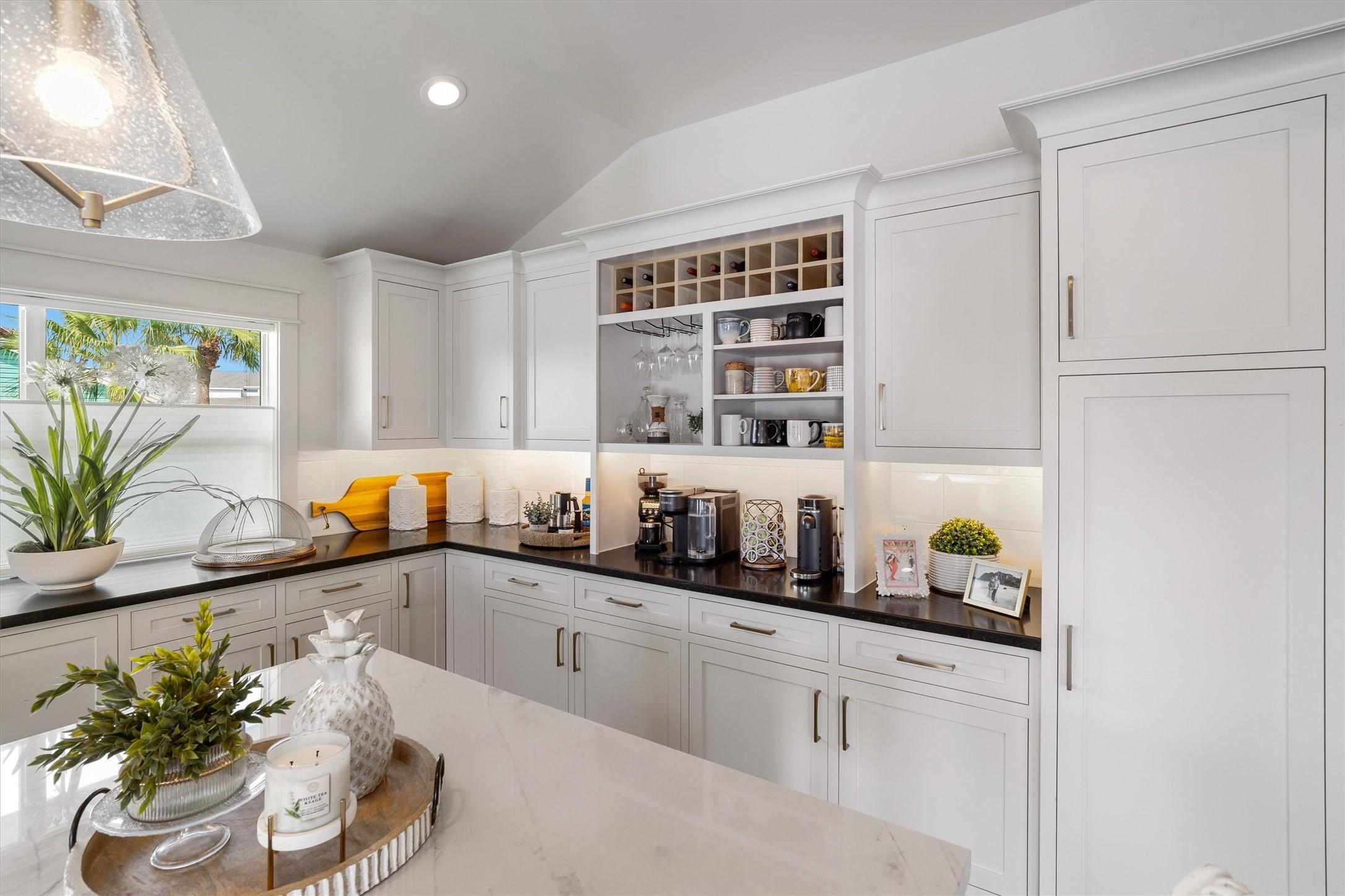 Image 3: The custom white cabinets with stylish contrasting