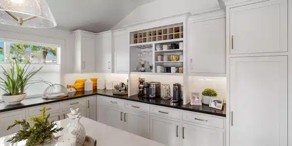 Image 3: The custom white cabinets with stylish contrasting