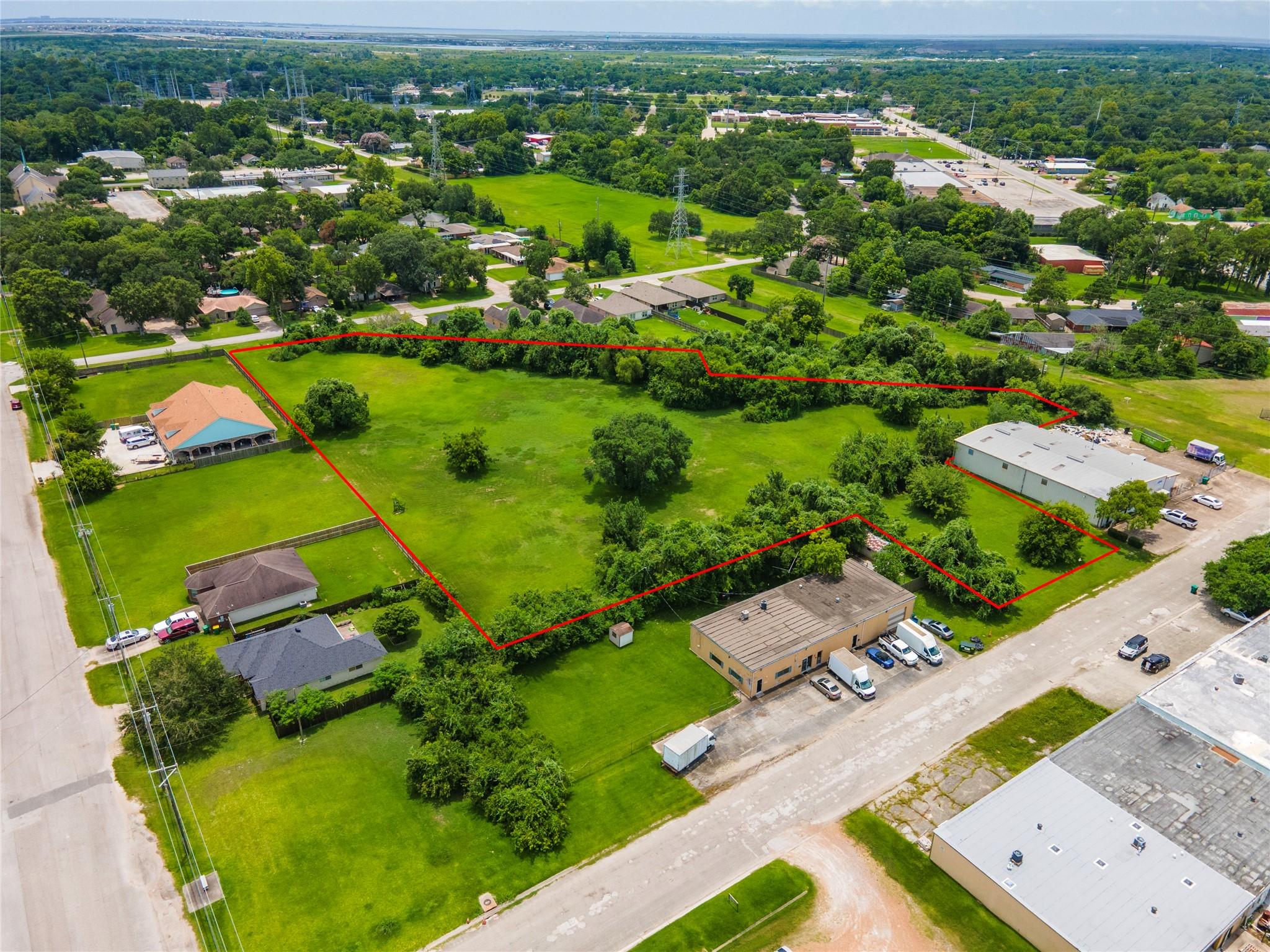 Image 2: Elevated aerial showing the expansive open tract a