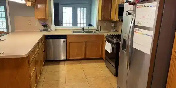 Image 4: Another view of the kitchen. Notice the opening ab