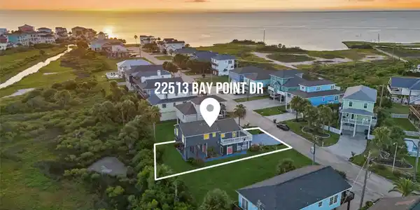 Image 2: This home is a short walk from the beach.