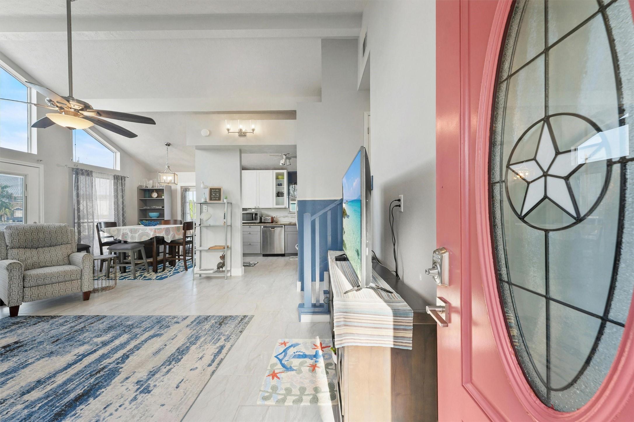 Image 3: Upon entering are high ceilings, natural lighting,