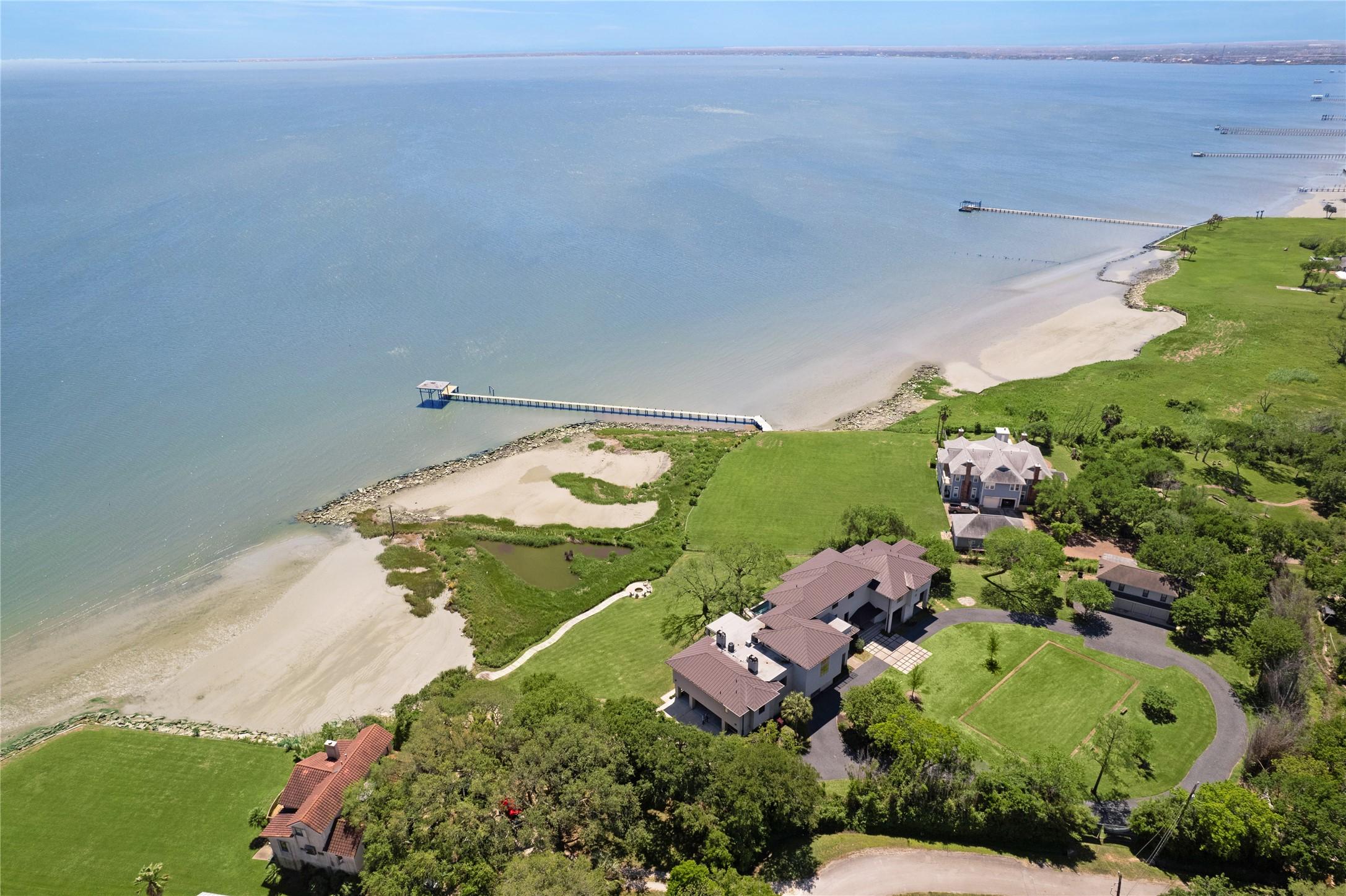 Image 4: The expansive property, with its own private beach