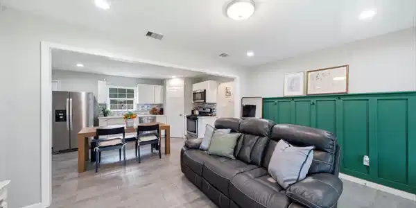 Image 4: Living room open to kitchen and dining