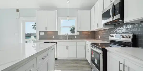 Image 4: The spacious island provides ample counter space,