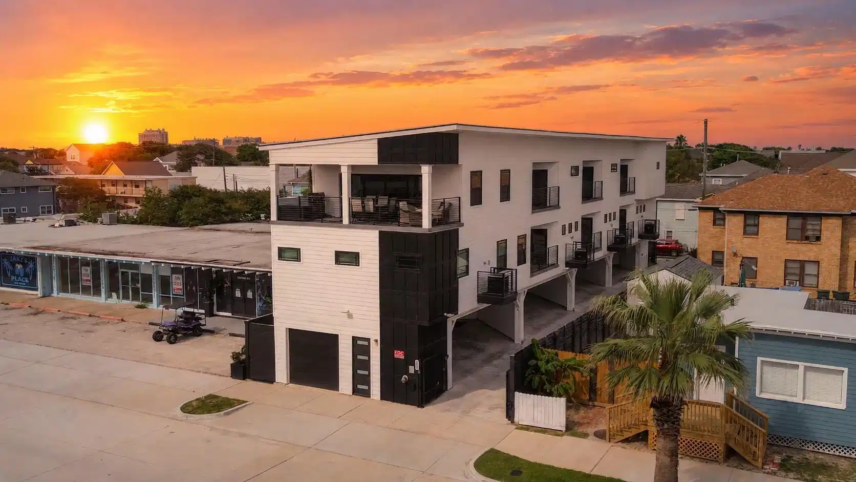 Image 1: Aerial view of townhomes