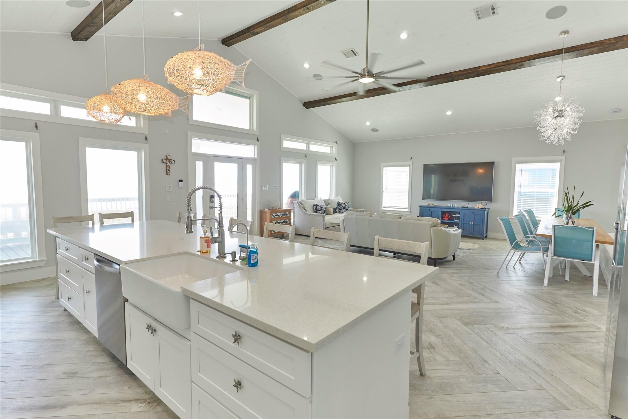 Image 2: Living room features beautiful flooring, a
ceilin