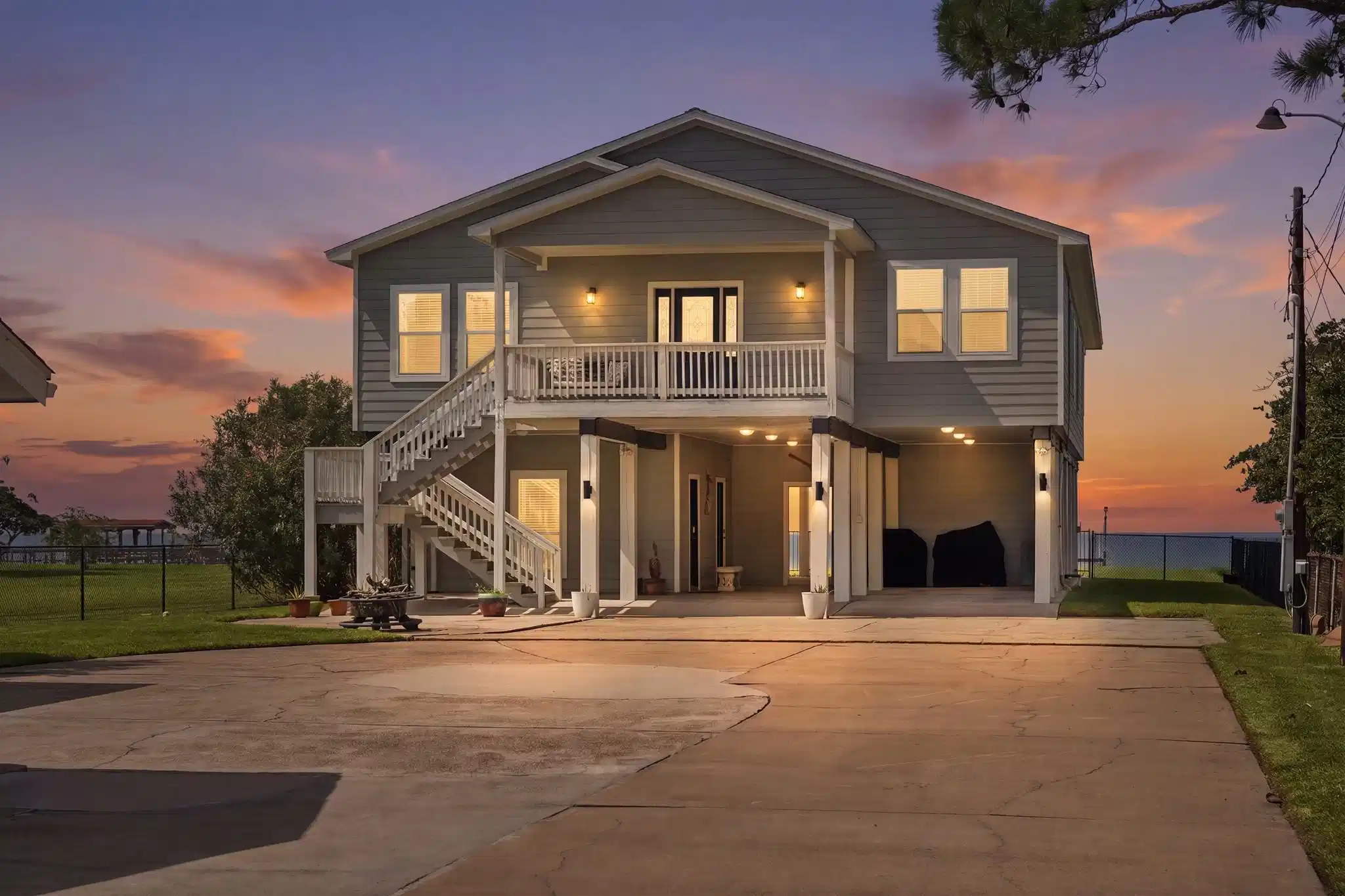 Image 1: Welcome home to your private, illuminated coastal