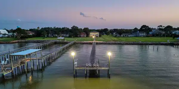 Image 3: Step out onto your private pier and breathe in the