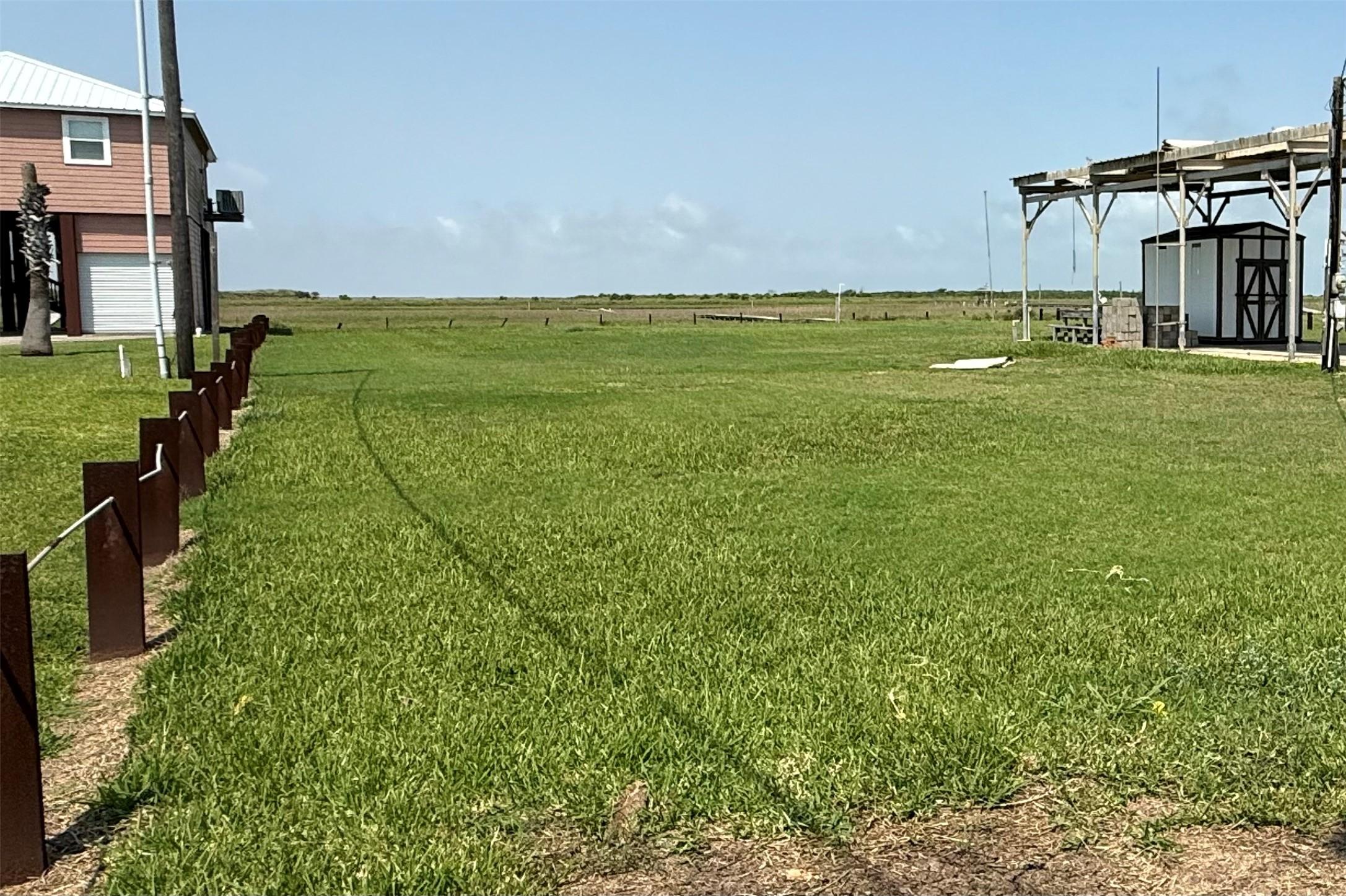 Image 4: Southern property line facing West toward creek.