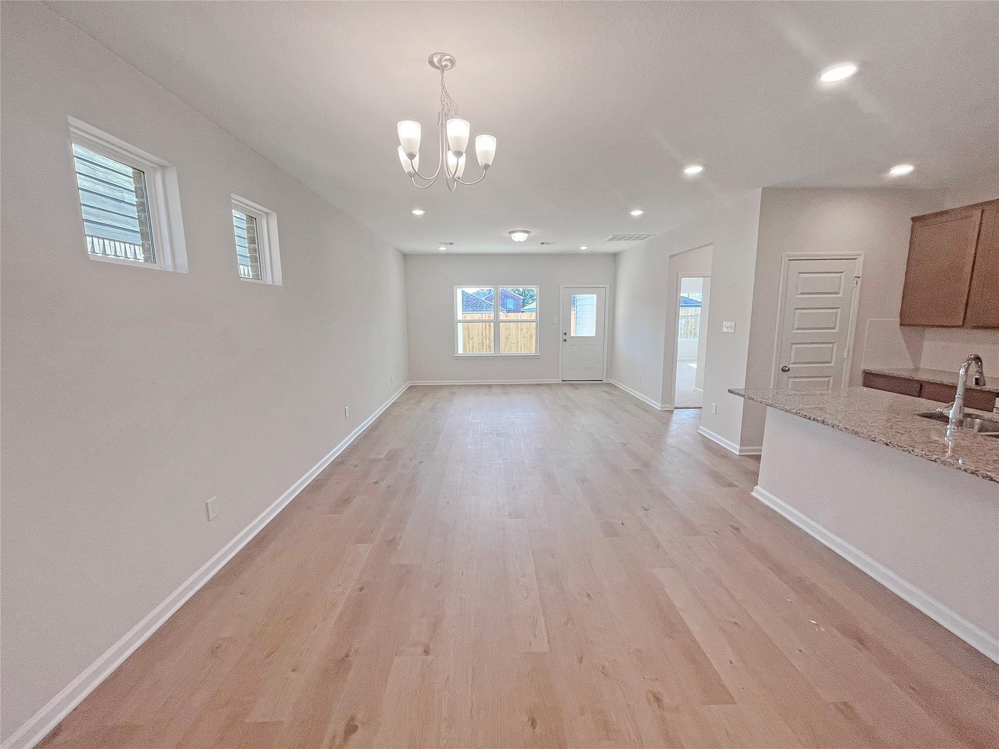 Image 3: The Robin II- Dining Area into Family Room. Sample