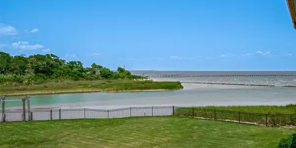 Image 4: Scenic water and marsh views just outside the home