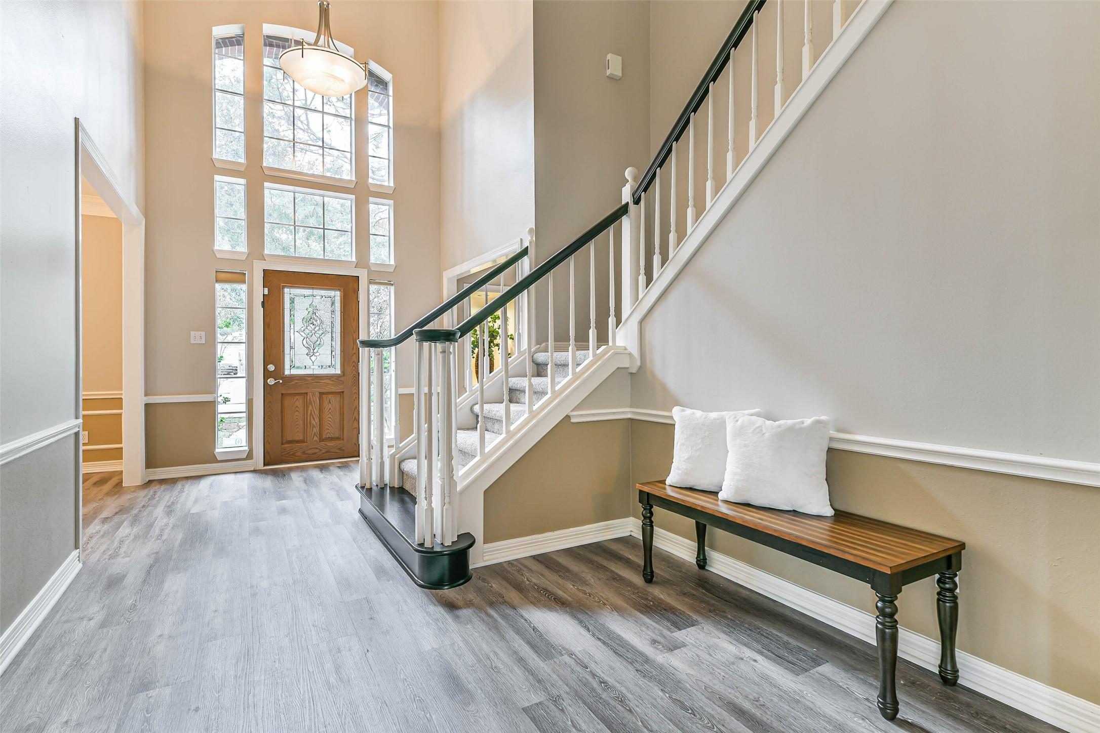 Image 3: From the family room, enjoy a welcoming view of th