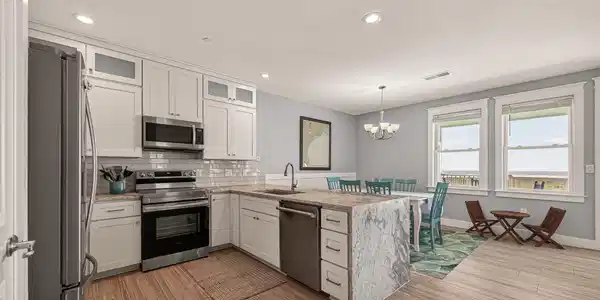 Image 4: Another shot of the remodeled kitchen, it all flow