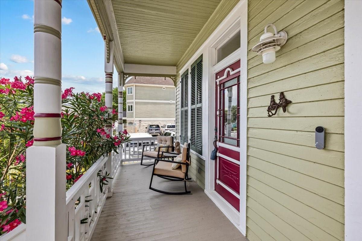 Image 3: Front porch living is a classic feature of the his