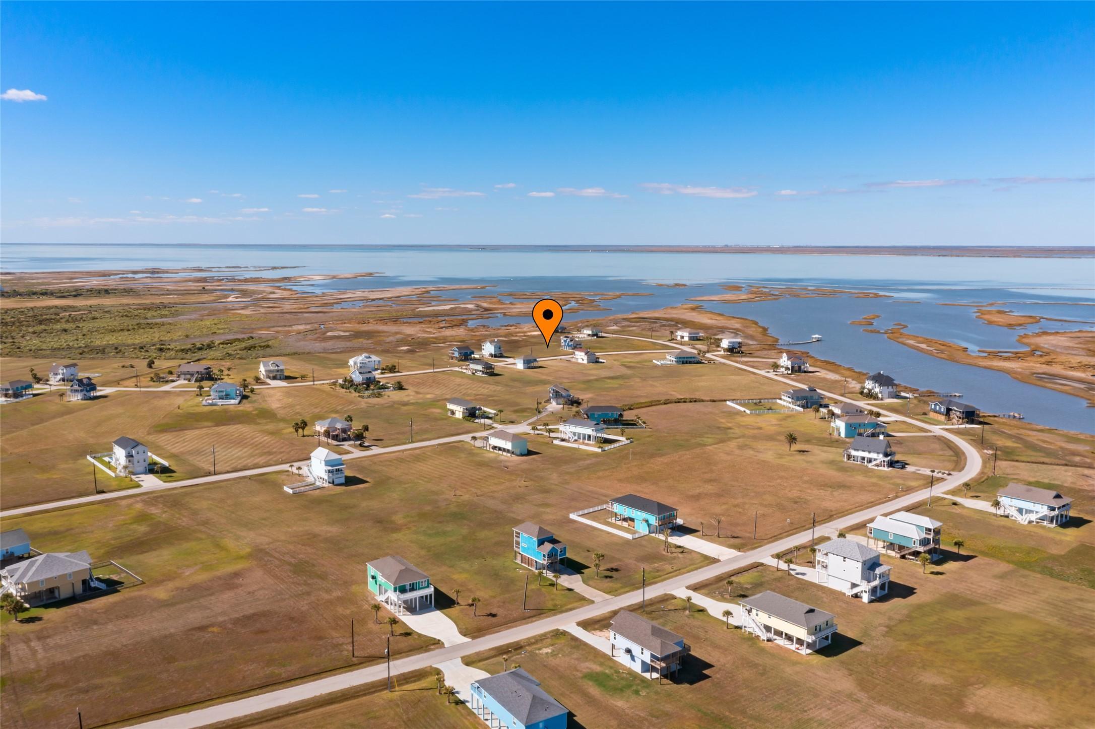 Image 1: This photo showcases a serene coastal community wi