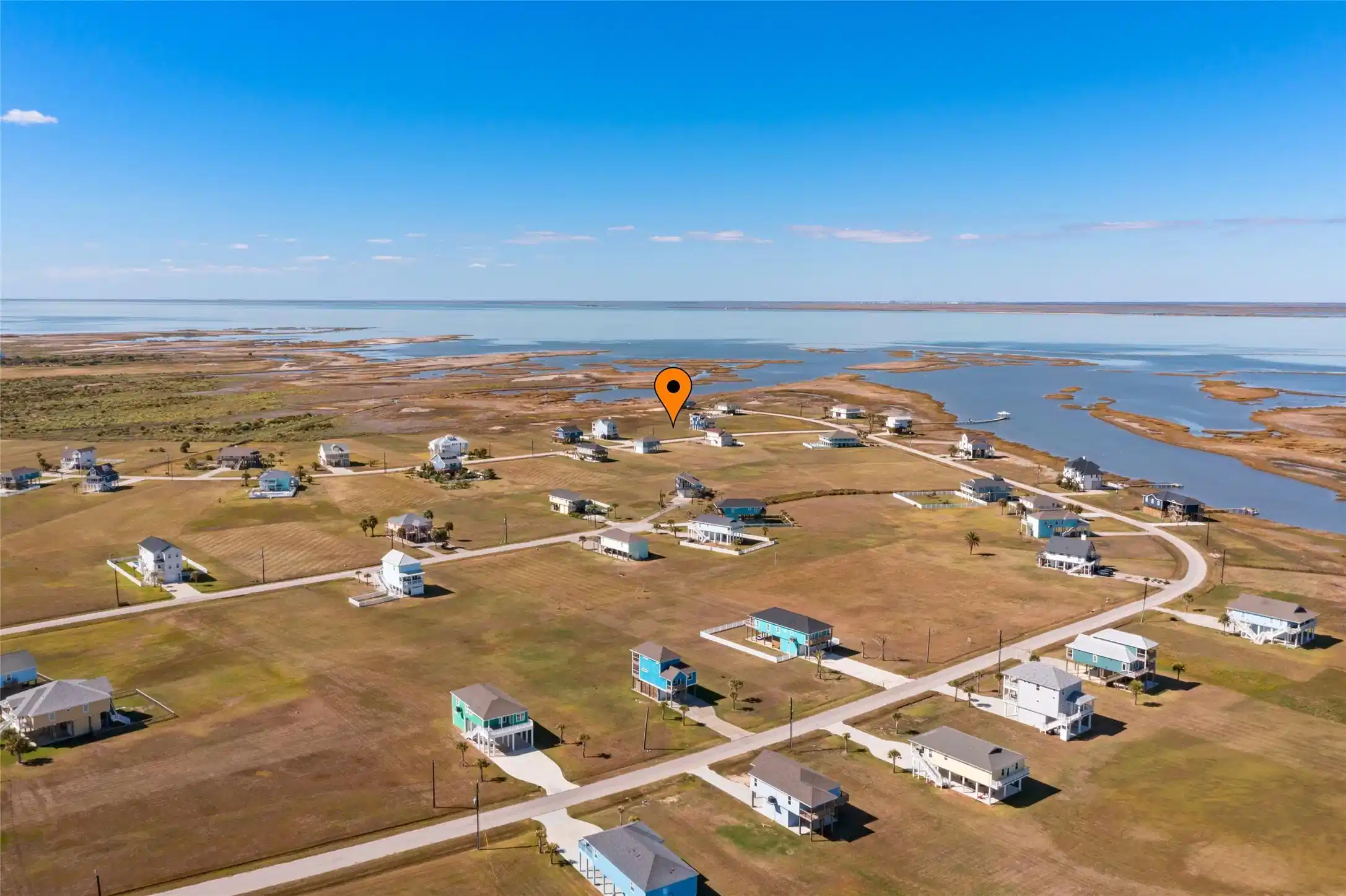 Image 1: This photo showcases a serene coastal community wi