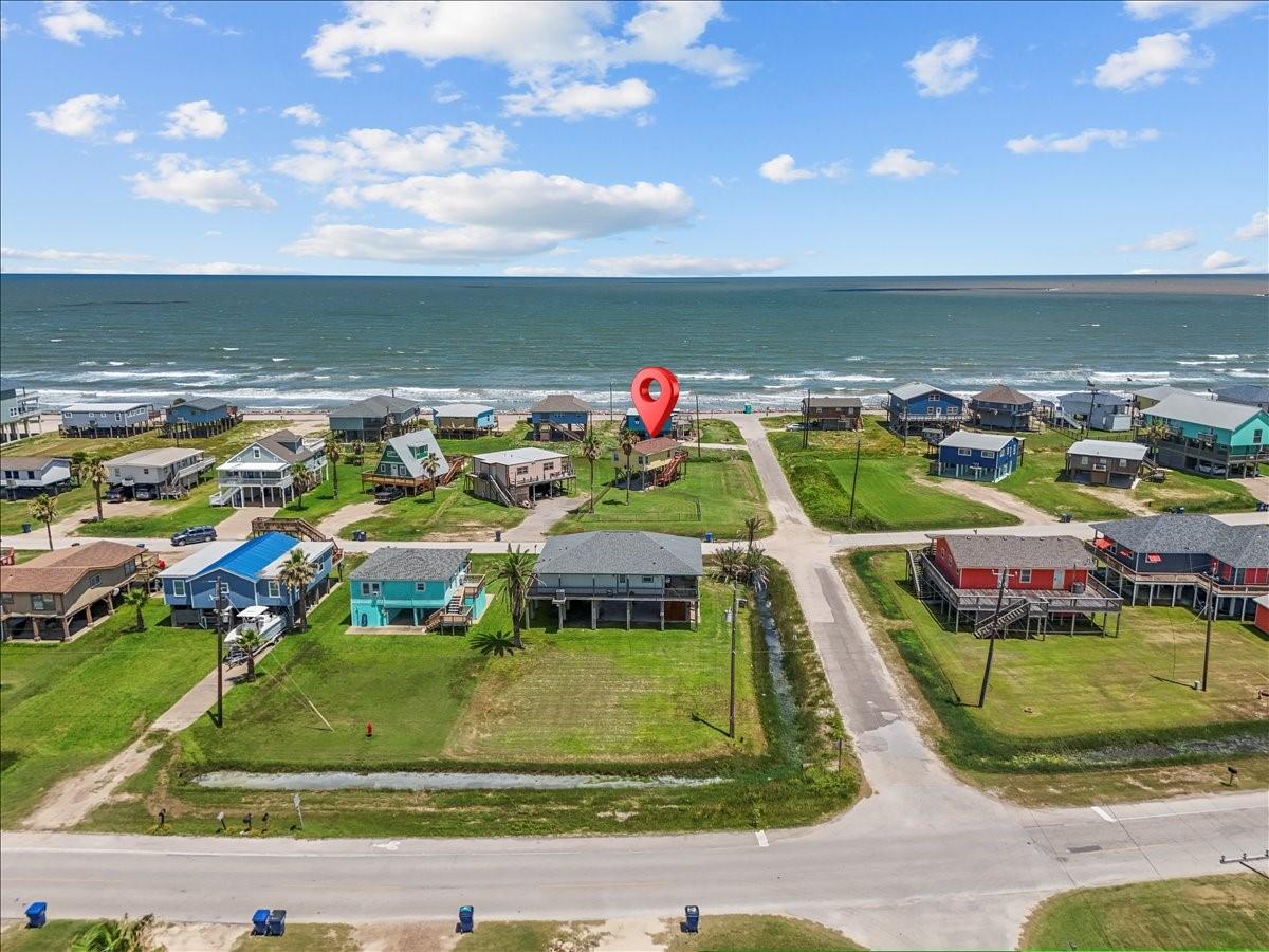 Image 2: This aerial photo showcases a charming coastal nei