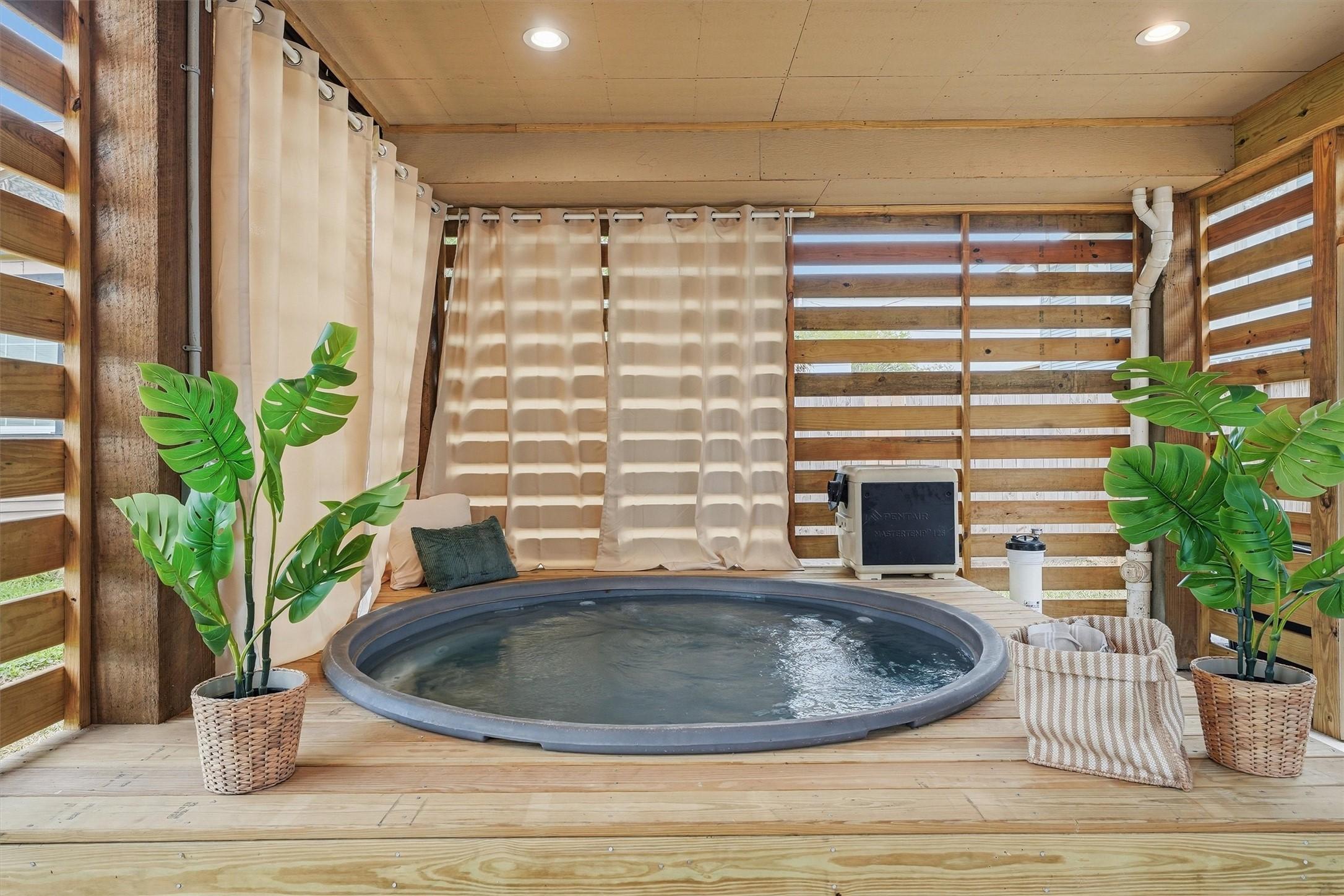 Image 2: This heated cowboy pool is a perfect place to rela