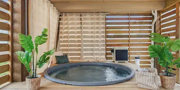 Image 2: This heated cowboy pool is a perfect place to rela