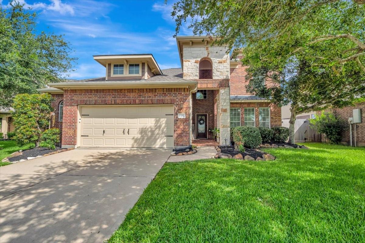 Image 2: Gorgeous brick and stone front elevation!