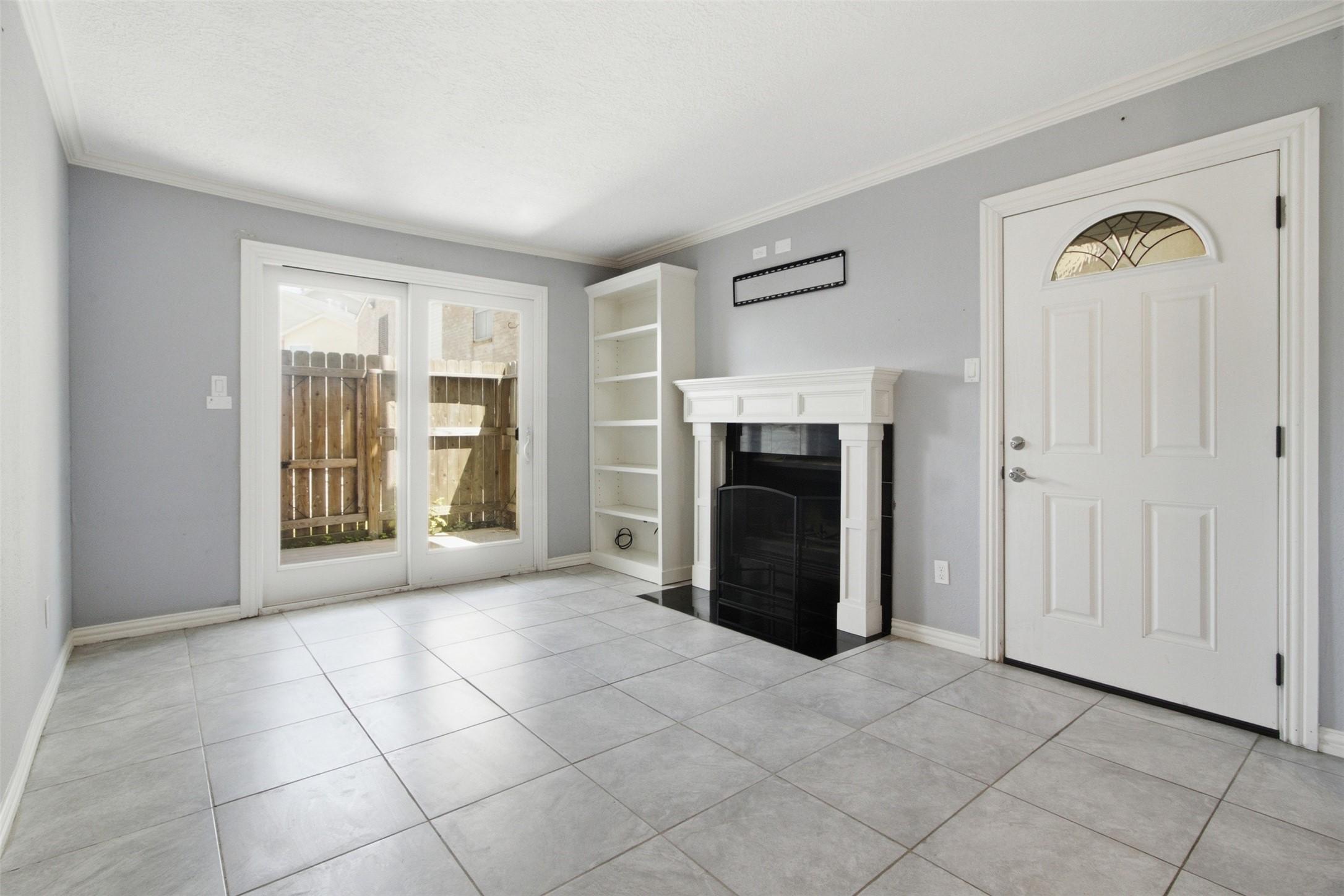 Image 2: Front door and side door view.