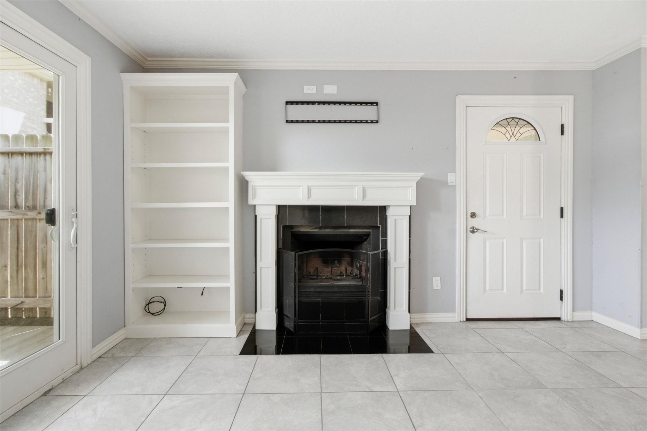 Image 3: Wood burning fireplace.