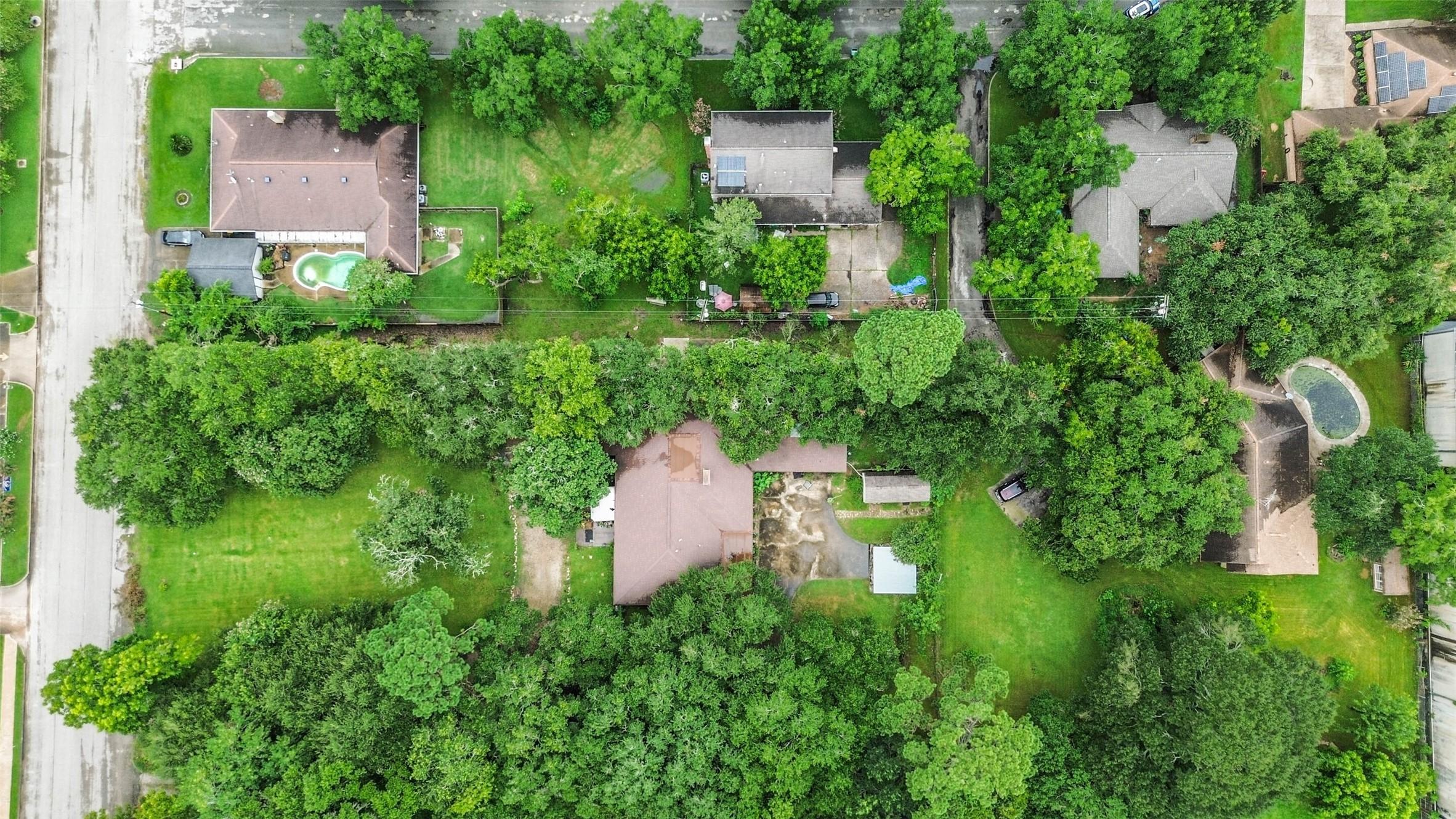 Image 3: Arial view directly above the property with lot on